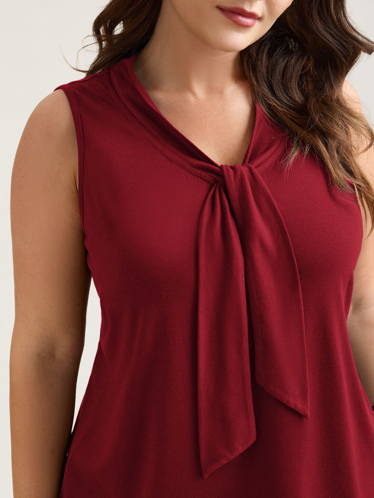 Knotted Neckline Fitted Sleeveless Blouse